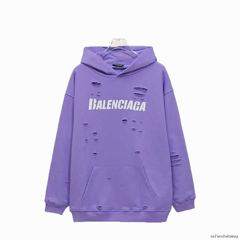 Balenciaga's ripped purple sweatshirt