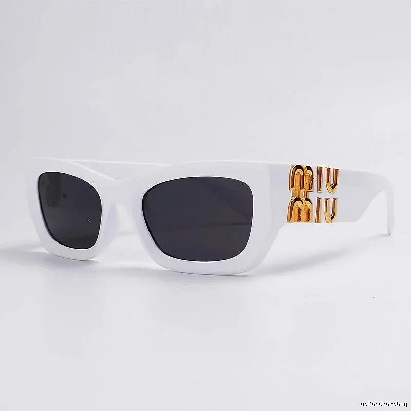 Miu Miu Monogram Oversized sunglasses Black Oval Sunglasses for Layered Styling